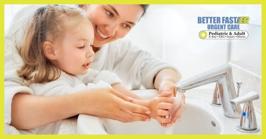 little girl and mom washing hands